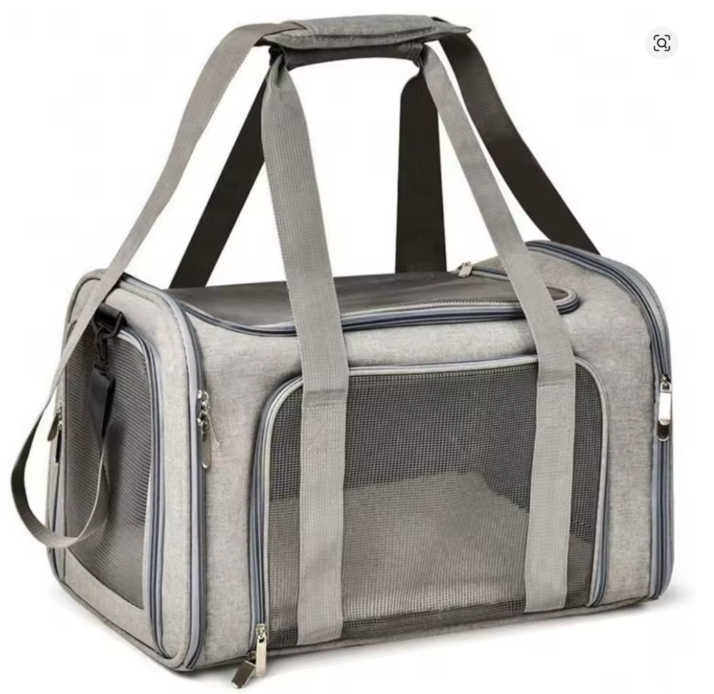 Sac de transport souple gris vu de trois quarts avec ses panneaux en maille